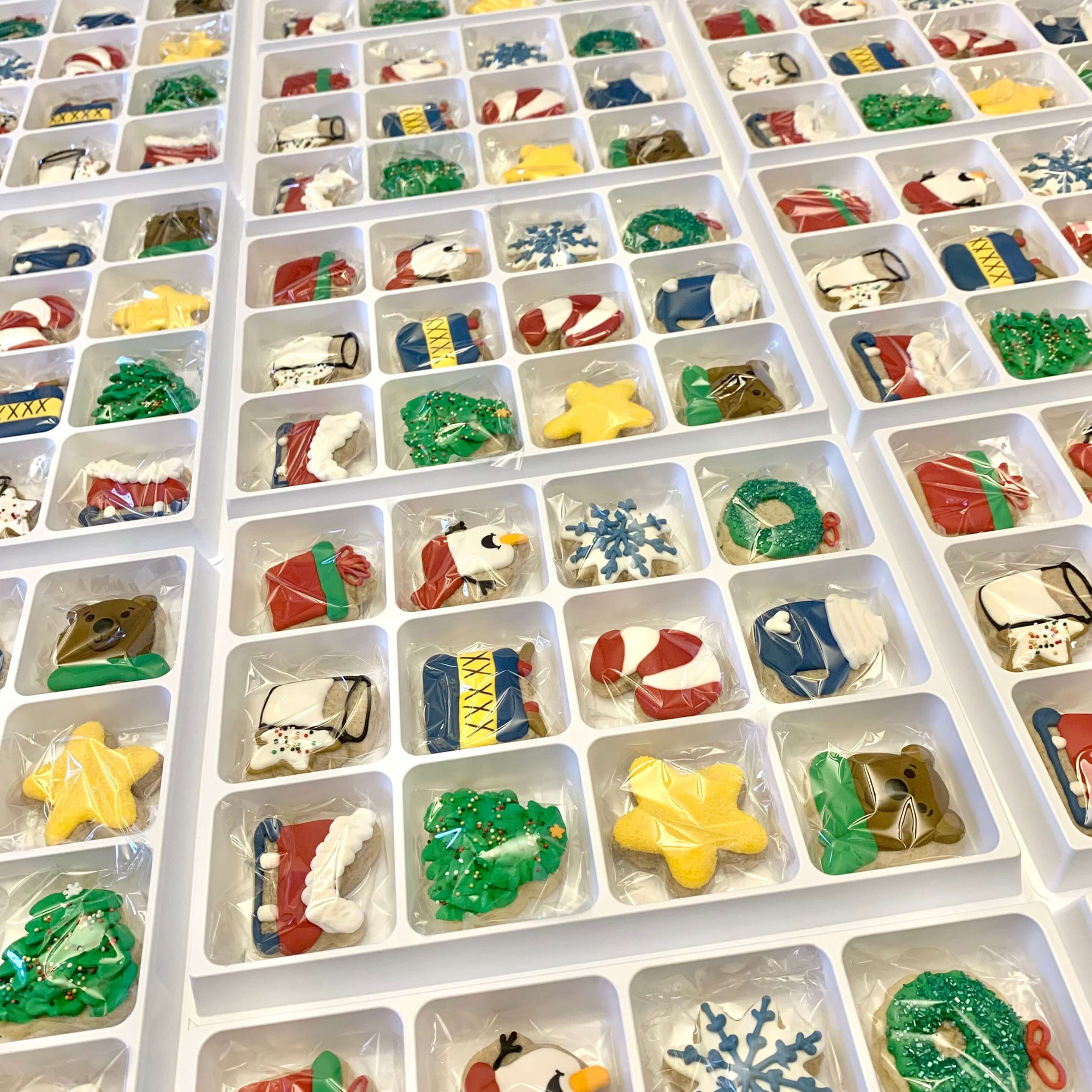 White Advent Calendar Trays Filled with Heat Sealed Christmas Cookies for Cookie Advent Calendar