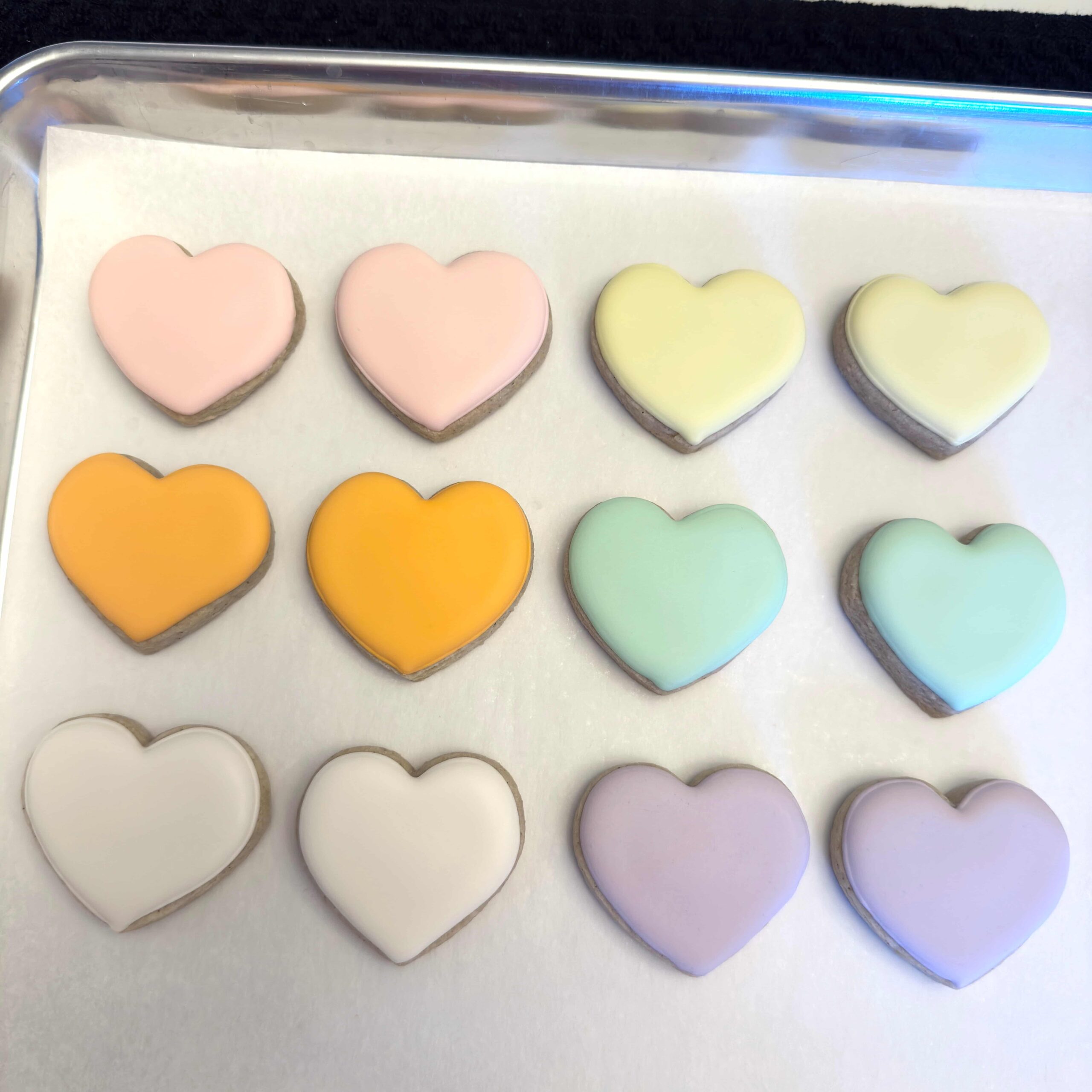 baked and iced conversation heart cookies