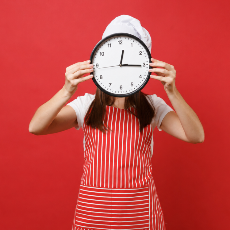 baker holding clock
